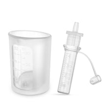 Load image into Gallery viewer, Clear measuring cup and syringe with measurement markings on a white background
